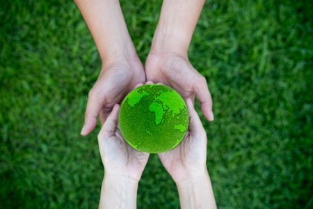 Environment Earth Day In the hands holding green earth on Bokeh green Background, Saving environment, and environmentally sustainable. Save Earth. Concept of the Environment World Earth Dayの写真素材