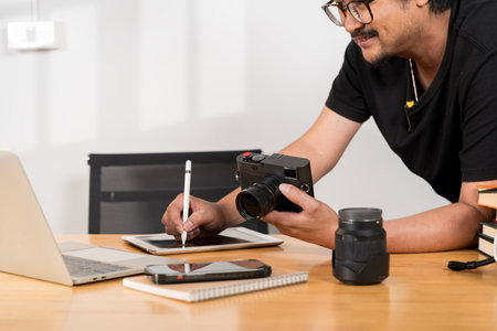 Vision, professional design pen and creative photographer working on camera process. Graphic tablet, laptop and photography man editing photoshoot, focus on digital art or retouching artistic photo.の写真素材