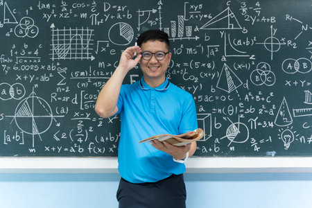 A mathematics teacher smiling confidently while standing before a blackboard filled with formulas...