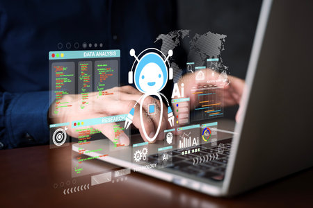 A digital AI robot analyzing data and research on a laptop computer, representing artificial...