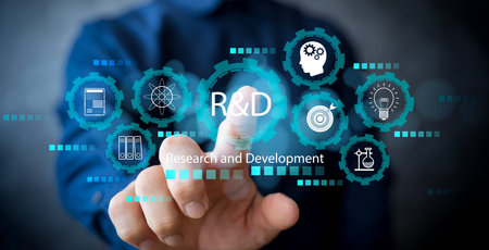 Business innovation and technology concept showing hand touching virtual interface with research and development icons representing creativity, scientific study, future innovation for company growth.の写真素材