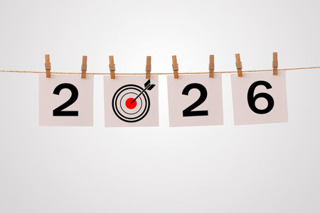 Creative concept of year 2026 showing business target and success idea with numbers hanging on rope...