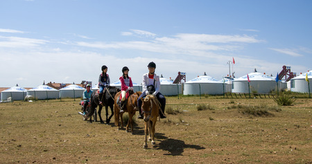 Prairie with horse ridingのeditorial素材