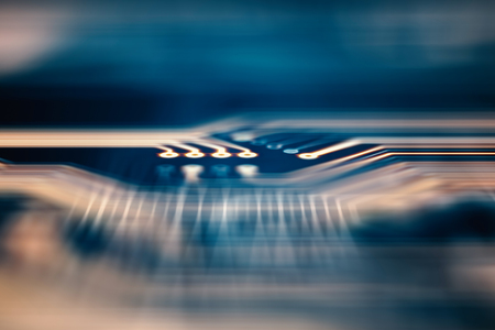 Circuit board futuristic server code processing. Orange, green, blue technology background with...