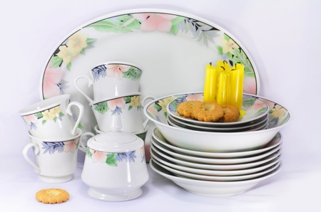 The dishes, candles and biscuits