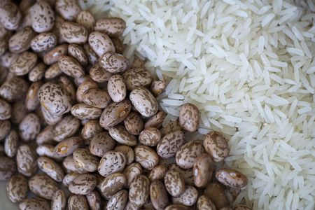 A portioning of pinto beans and jasmine rice (both raw).の写真素材