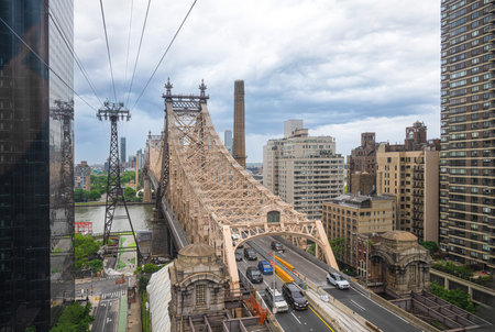 Queensboro bridge and a tramway to Roosevelt Island, Manhattan in New Yorkの写真素材