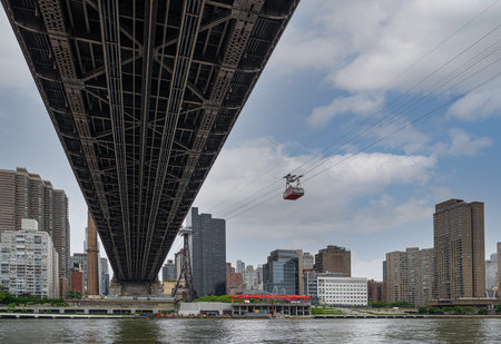 Under the Queensboro bridge. Tramway to Roosevelt Island, Manhattan in New Yorkの写真素材