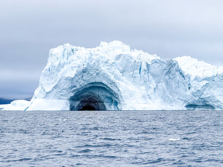 Greenland, Uummannaq fjord with giant floes and cave