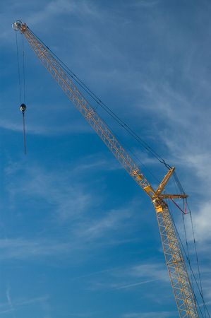 Yellow crane on a building site