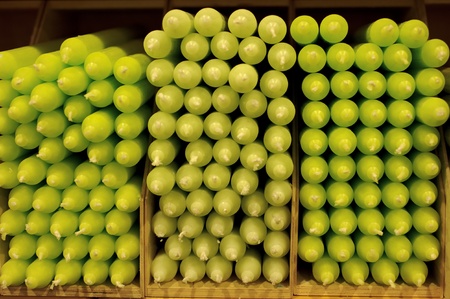 Colorful stack of candles on shelve in storeの写真素材