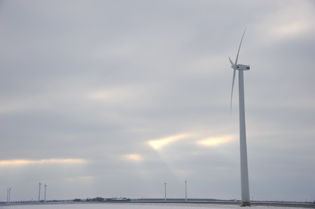 Wind turbine in winter with snow