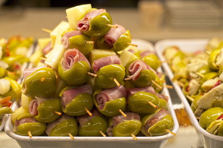 Tapas with olives, ham and cheeseの写真素材
