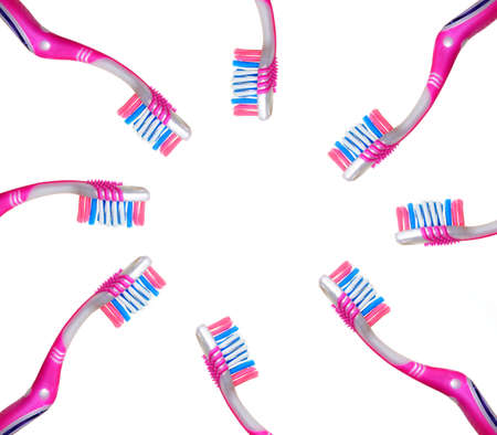 multiple toothbrushes on white backgroundの写真素材