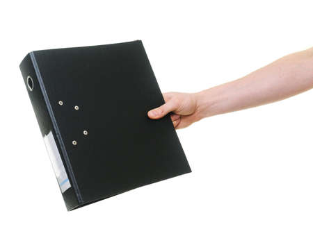 hand passing ring binder isolated on whiteの写真素材