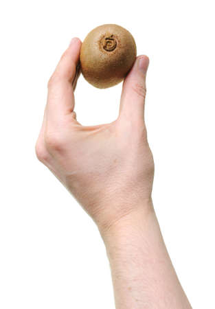 hand holding kiwi isolated on white backgroundの写真素材