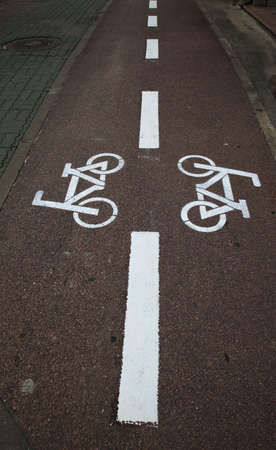 double sign on tarmac bicycle