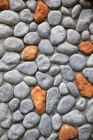 grunge colored stone wall background for multiple usesの写真素材