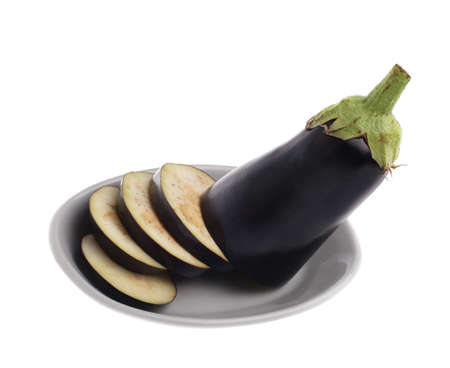 sliced egg-plant on plate isolated over white backgroundの写真素材