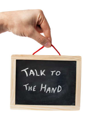 blackboard message held by hand isolated on white backgroundの写真素材