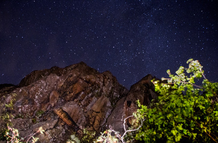 The Stars shine above Ely's Peak near Duluth, Minnesota during a Summer Nightの写真素材