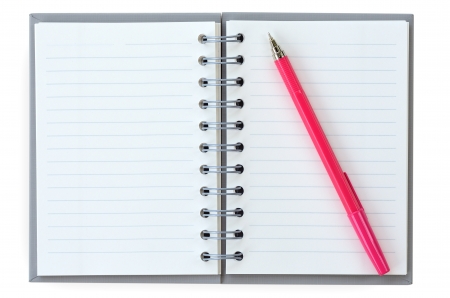 Open notebook with red pen.の写真素材
