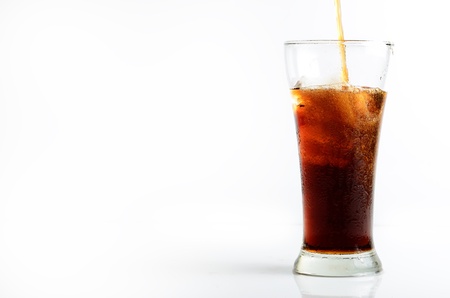 Filling cola in a glass.の写真素材
