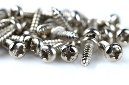 Closeup of screw isolated on white.