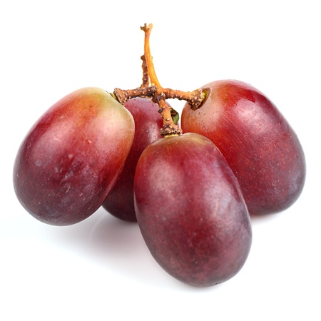 Red grapes isolated on white.の写真素材
