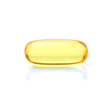Fish oil capsule isolated on white.の写真素材
