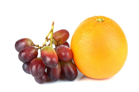 Fresh orange and grapes islolated on white.の写真素材