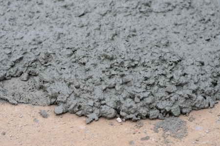 Wet cement on new constructing street の写真素材