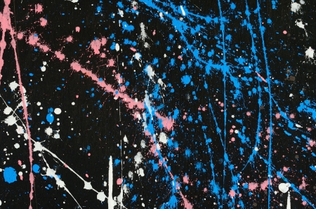 Abstract splash color on black.の写真素材
