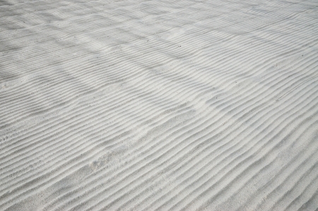 Manmade texture on white sand.の写真素材