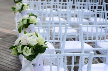 Close up of flower decorated on wedding chairの写真素材