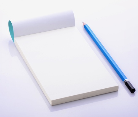 Blank open notebook with pencilの写真素材