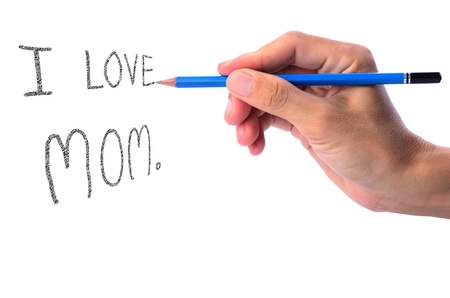 Man's hand holding pencil writing word, I love MOMの写真素材