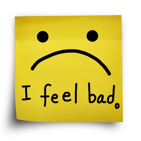 I feel bad note on yellow sticker paper note isolatedの写真素材