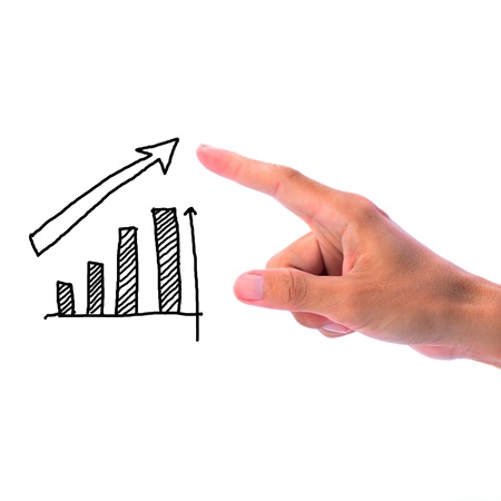 Man hand touching and pointing at hand drawing of growing business abstractの写真素材