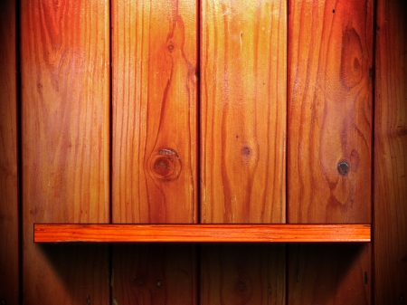 Empty wood wall and shelf with light and shadowの写真素材