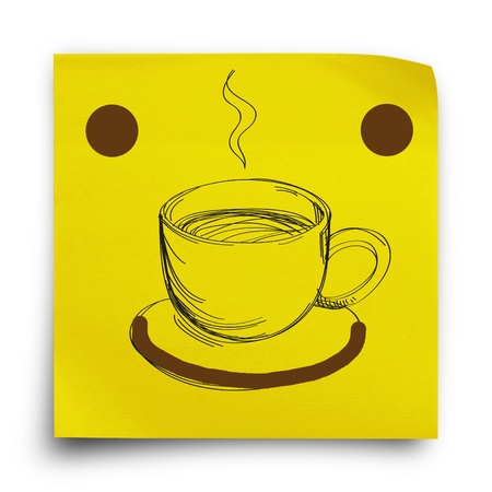 Yellow sticker paper note with smiley and coffee cup drawingの写真素材