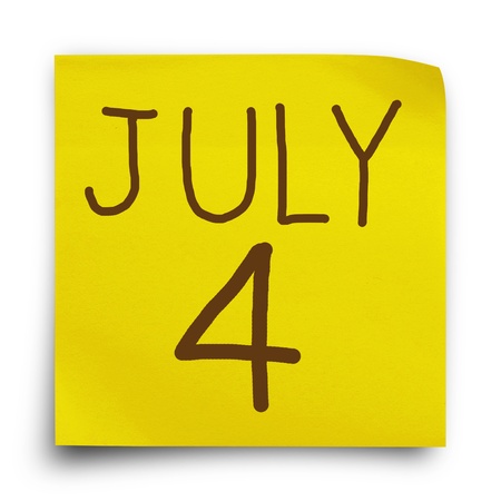 Date July 4 on yellow sticker paper note, の写真素材