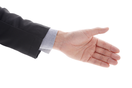 Businessman giving hand for handshake to friend, partner, or team. Business concept in agreement or make deal. Isolated on white.の写真素材