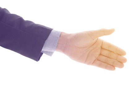 Businessman giving hand for handshake. Business concept in agreement or make deal. Retro filter with vintage tone style and glow light effect.の写真素材