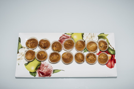 Home made muffins isolated on a tableの写真素材