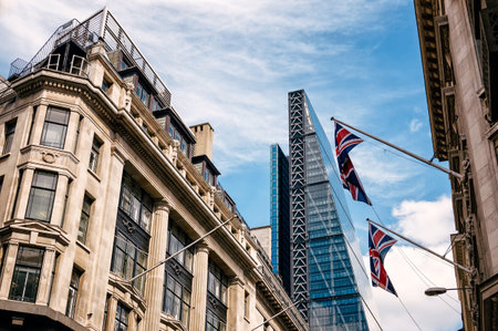 LONDON, UK - AUGUST 21, 2015:  Street in the city of London with the contrast  between historical buildings and new skyscrapersのeditorial素材
