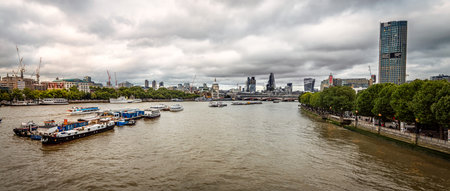 LONDON, UK - AUGUST 20, 2015: London cityscape at sunset: St Paul and the skyscrapers of The Cityのeditorial素材