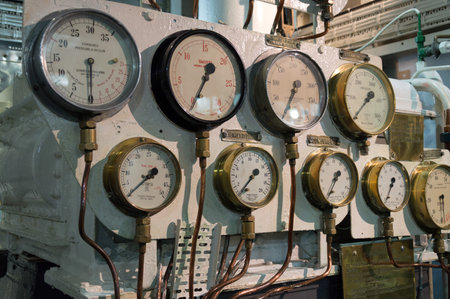 LONDON, UK - AUGUST 22, 2015:   Detailed view of many manometers inside of the Royal Navy warship HMS Belfast in London.のeditorial素材