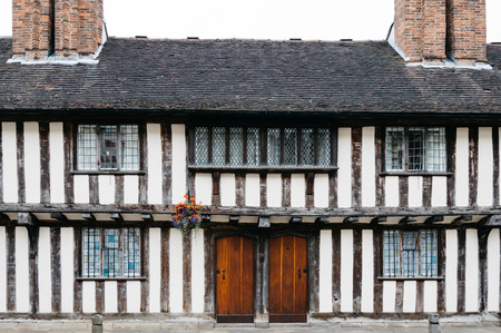 Front view of typical Tudor houset, a cloudy dayの写真素材
