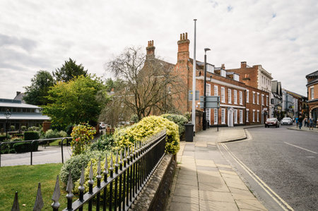 Winchester, UK - August 16, 2015: Street in the center of the city a cloudy day. It is the ancient capital of England and former seat of King Alfred the Great.のeditorial素材